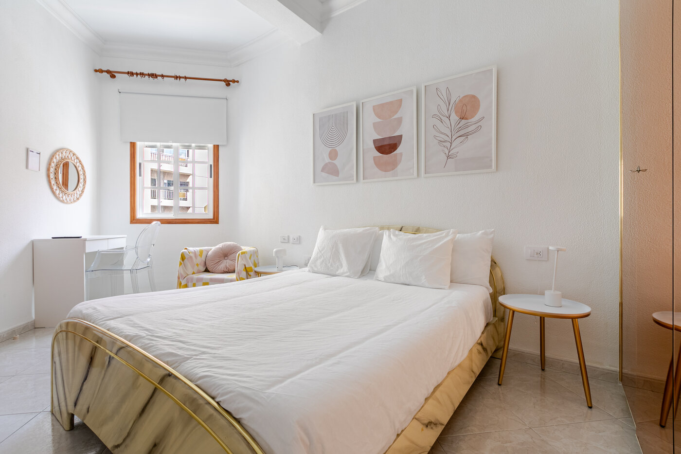 Main suite at De Villa Suites with a double bed